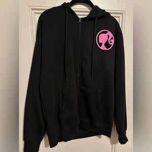 BRAND NEW W/ TAGS BARBIE BLACK & PINK HOODIE SZ LARGE JUNIORS. PICTURE ON BACK.